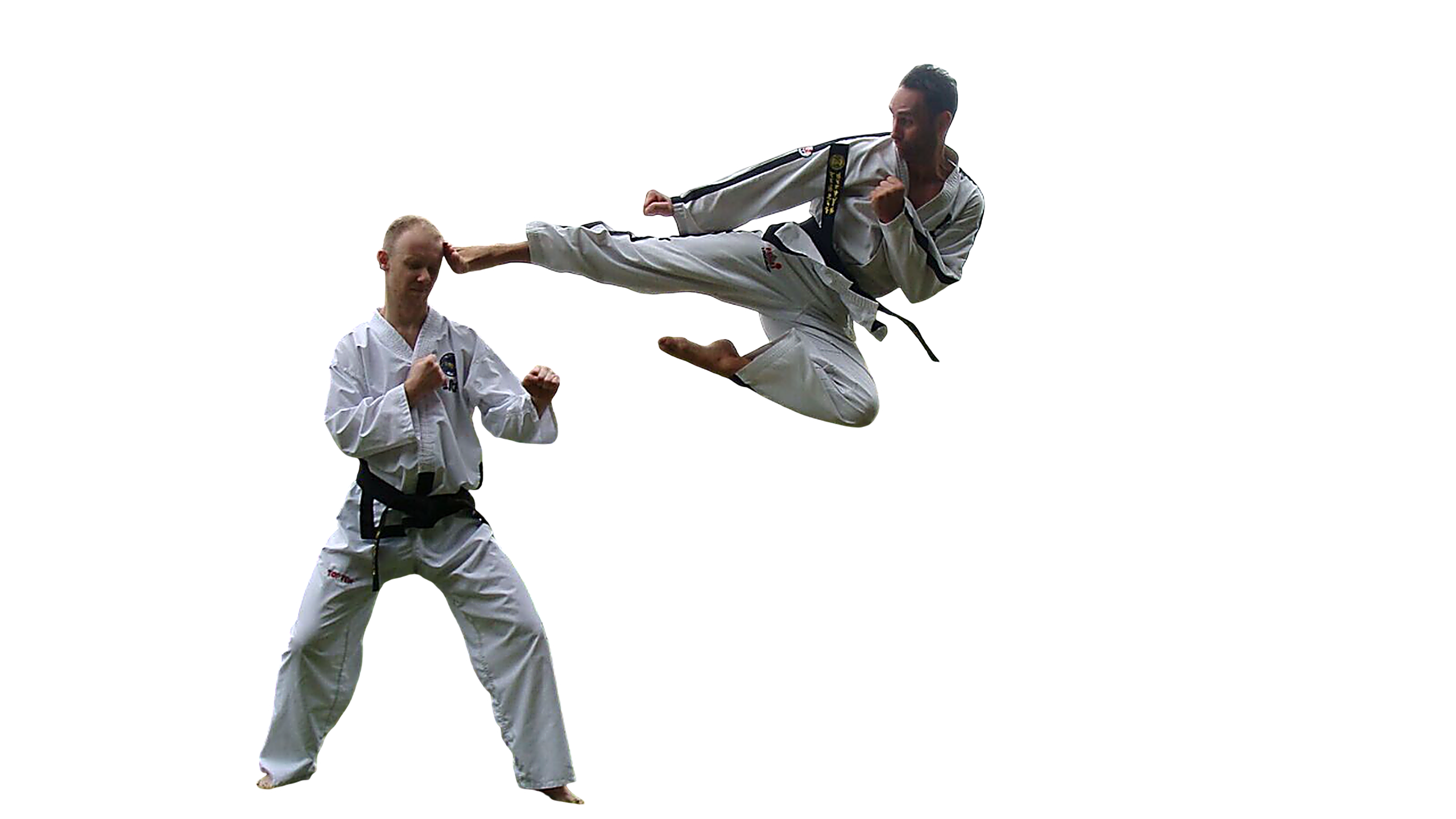 Master Jack de Smit voert een sprongtrap uit richting een leerling
